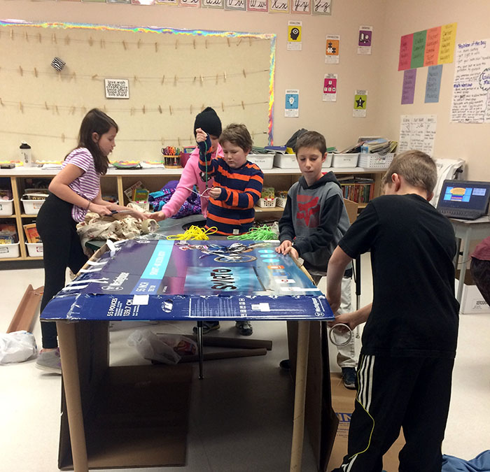 Children working together in a classroom. 