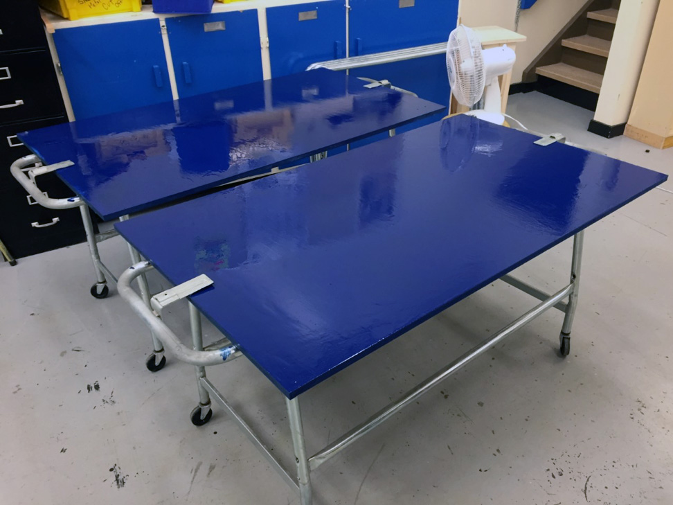 Two blue tables.